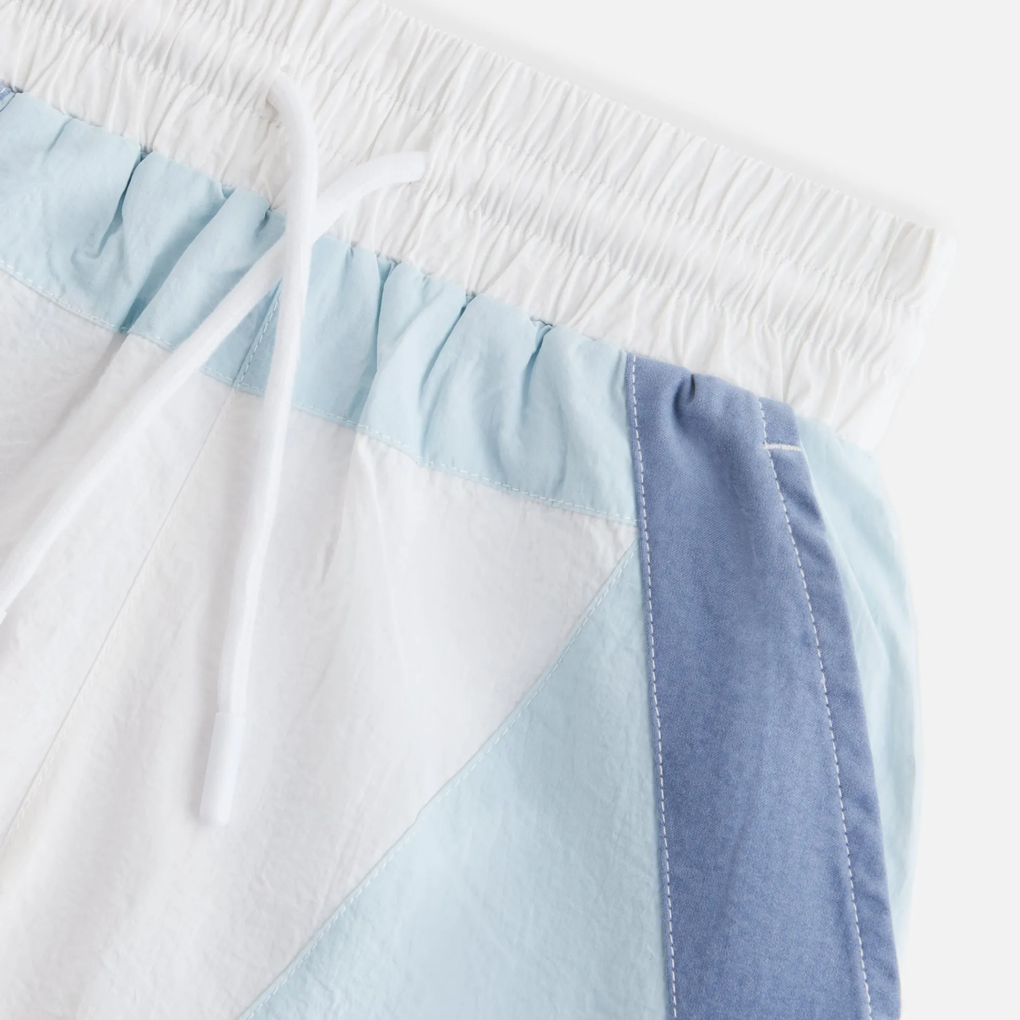 Discount Kith Kids Turbo Track Short Sandrift